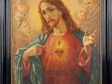 a painting of jesus holding the sacred heart of jesus