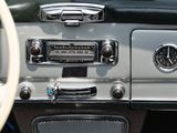 a car dashboard with a steering wheel and a clock on it