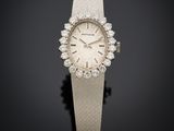 une montre-bracelet pour femme sertie de diamants, signée Cartier