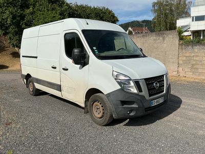 a white van that is parked on the side of the road