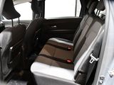 the back seats of a car with a seat belt in the back of it