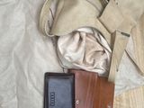 a purse and a wallet on the floor