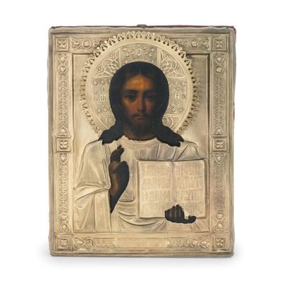 une image représentant une icône religieuse de Jésus tenant un livre