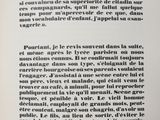 an open book with a black and white text on it