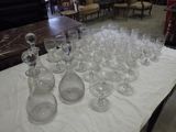 a table with a lot of empty wine glasses on it