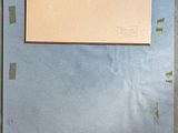 a picture of a piece of paper taped to a wall