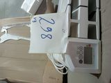 a box with a sign on it sitting on the floor