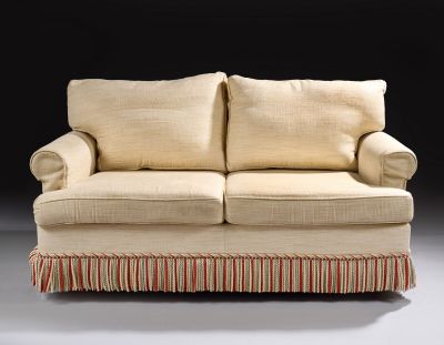 an image of a couch with a red and white striped skirt