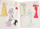 an open book with a drawing of a woman in a dress and a dog on a leash
