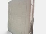 an image of a mattress on a white surface