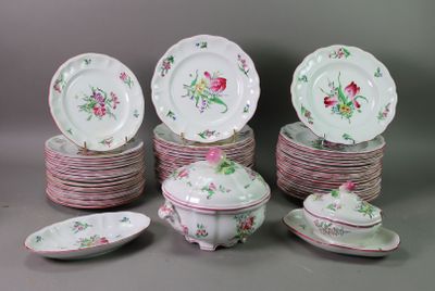 a lot of plates and bowls with flowers on them