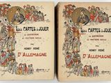 two books with illustrations on them are sitting on a table