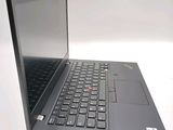 a laptop computer sitting on a table with a white background