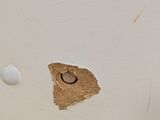 a hole in the wall that has a hole in it