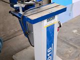 an image of a machine that is sitting in a garage