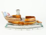 a small boat that is sitting on top of a table