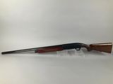 a rifle on a white background