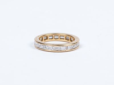 CARTIER. Alliance en or jaune (750/1000e) ornée de 20 diaman… - Photo 1