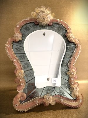 a picture of a mirror that is sitting on a table