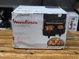 an image of a box of food sitting on top of a wooden table