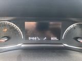 the dashboard of a car with a digital display on it