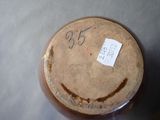 a jar with a sticker on it sitting on a table