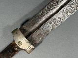 a close up of a knife that is on a table