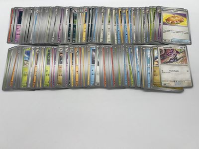 a bunch of cards sitting on top of each other on a table