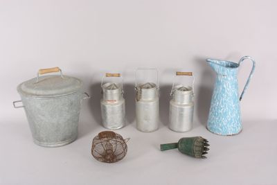 many different types of tins and containers on the table