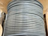a box with a bunch of gray wires in it
