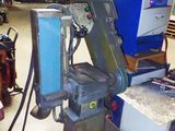 a machine that is sitting on a table in a warehouse