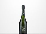 a bottle of champagne sitting on top of a table