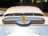 a close up of a car ' s emblem on the front of it