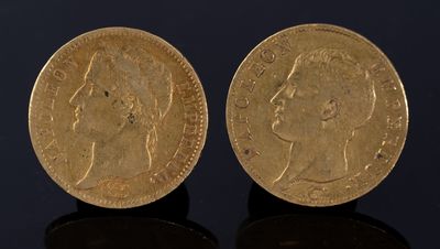 deux souverains d'or, dont l'un est orné d'une tête et l'autre d'une couronne