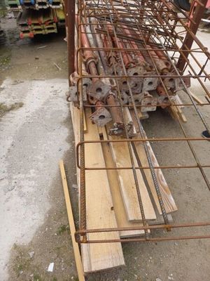 several pieces of wood are stacked on top of each other in a pile