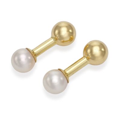une paire de boucles d'oreilles en perles et or sur fond blanc