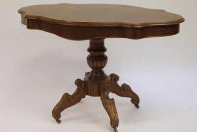an image of a small table with a wooden top