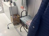 a coat hanging on a rack in a store