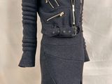an image of a mannequin dress with a jacket and skirt