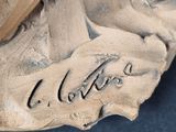 a close up of a baseball glove with a name on it