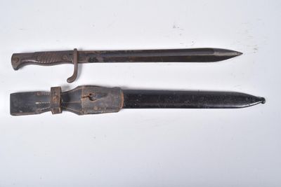 two knives that have been left on the table