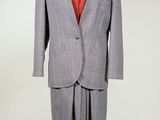 an image of a suit on a mannequin stand