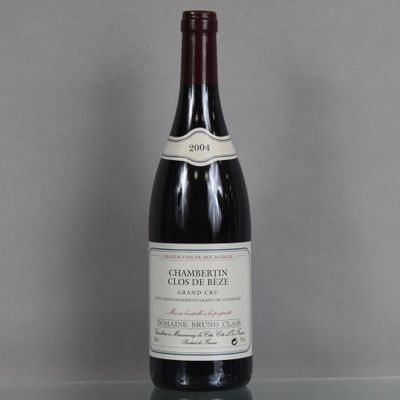 a bottle of wine that is sitting on a table