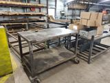 an image of a large industrial work table in a warehouse