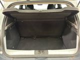 a trunk of a car with the back door open