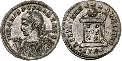 a silver coin with an image of a woman on it