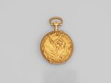 une montre de poche ancienne en or, ornée d'un motif floral sur le cadran