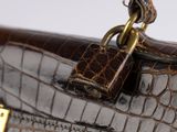 a close up of a purse with a padlock on it