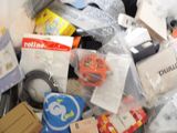 a pile of assorted items sitting on the floor