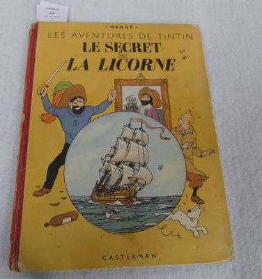 an old children ' s book with a picture of a man on a ship